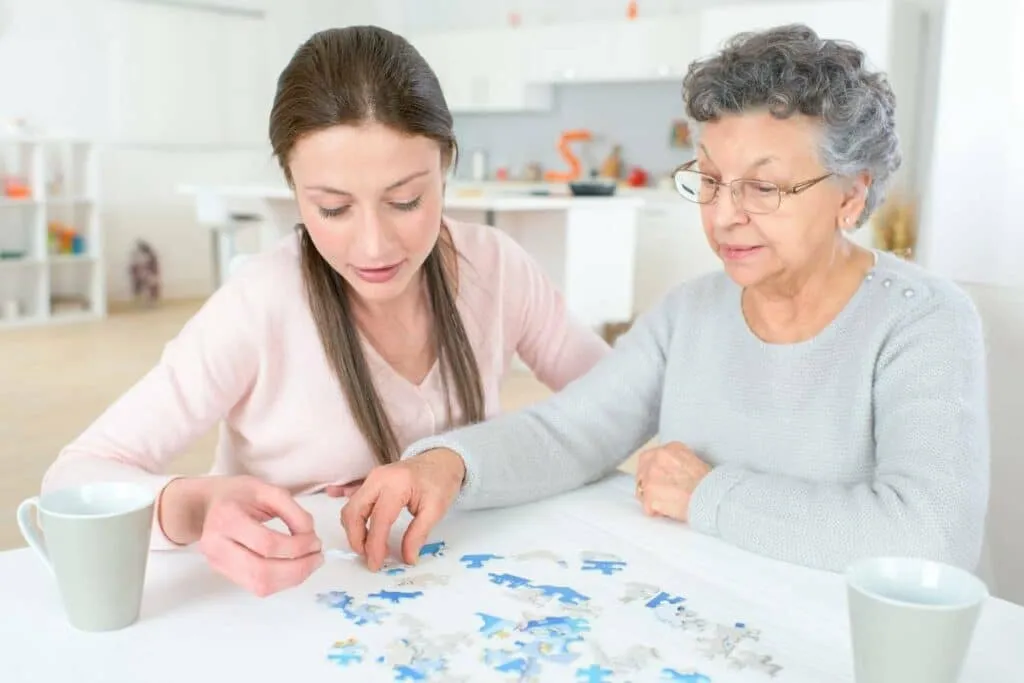 Abney & Baker caregiver providing home support to a client in Devizes, Wiltshire.